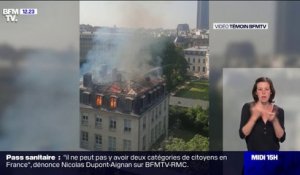 Le toit d'un immeuble parisien proche de Matignon prend feu