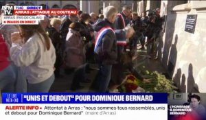 Rassemblement en hommage à Dominique Bernard: les habitants d'Arras déposent des fleurs en hommage au professeur