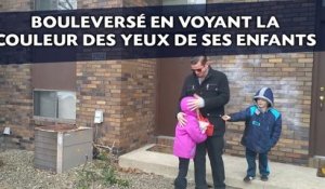 Bouleversé en voyant enfin la couleur des yeux de ses enfants