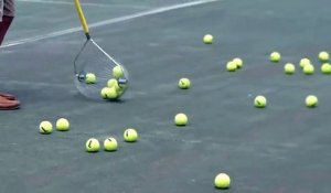 Un rouleau qui ramasse les balle de tennis