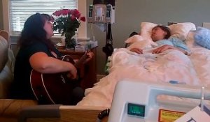 Cette maman joue une dernière fois de la guitare pour sa fille mourante..; Tellement émouvant