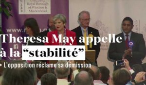 Theresa May appelle à la stabilité après avoir perdu la majorité absolue
