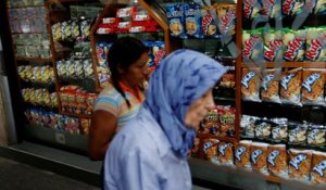A Caracas, les files de la faim