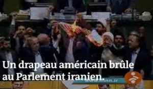 Un drapeau américain brûlé dans l’enceinte du Parlement iranien