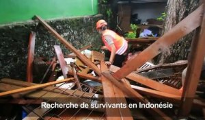 Indonésie: les secouristes fouillent les décombres