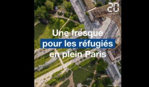 Paris: Une fresque pour les réfugiés aux pieds de la tour Eiffel