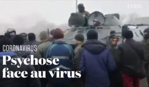 Coronavirus : en Ukraine, des habitants barrent la route aux évacués