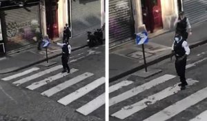 Un policier danse dans la rue dans le 18e à Paris