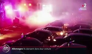 Allemagne : des fêtards dansent dans leur voiture sur le parking d'une boite de nuit