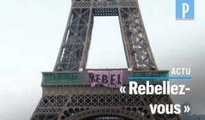 Extinction Rebellion déploie une banderole sur la tour Eiffel
