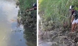 Un homme se retrouve bloqué face à un crocodile