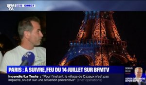 Les parisiens prêts à admirer le feu d'artifice tiré depuis la tour Eiffel
