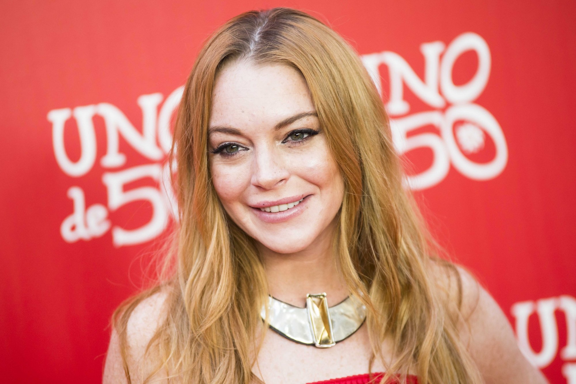 Lindsay Lohan lors du vingtième anniversaire de UNOde50 à Madrid, le 9 juin 2016.