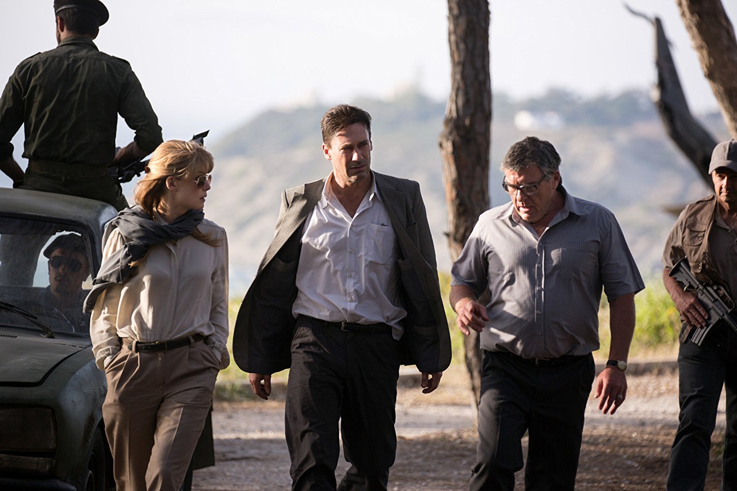 Dean Norris, Jon Hamm et Rosamund Pike dans 